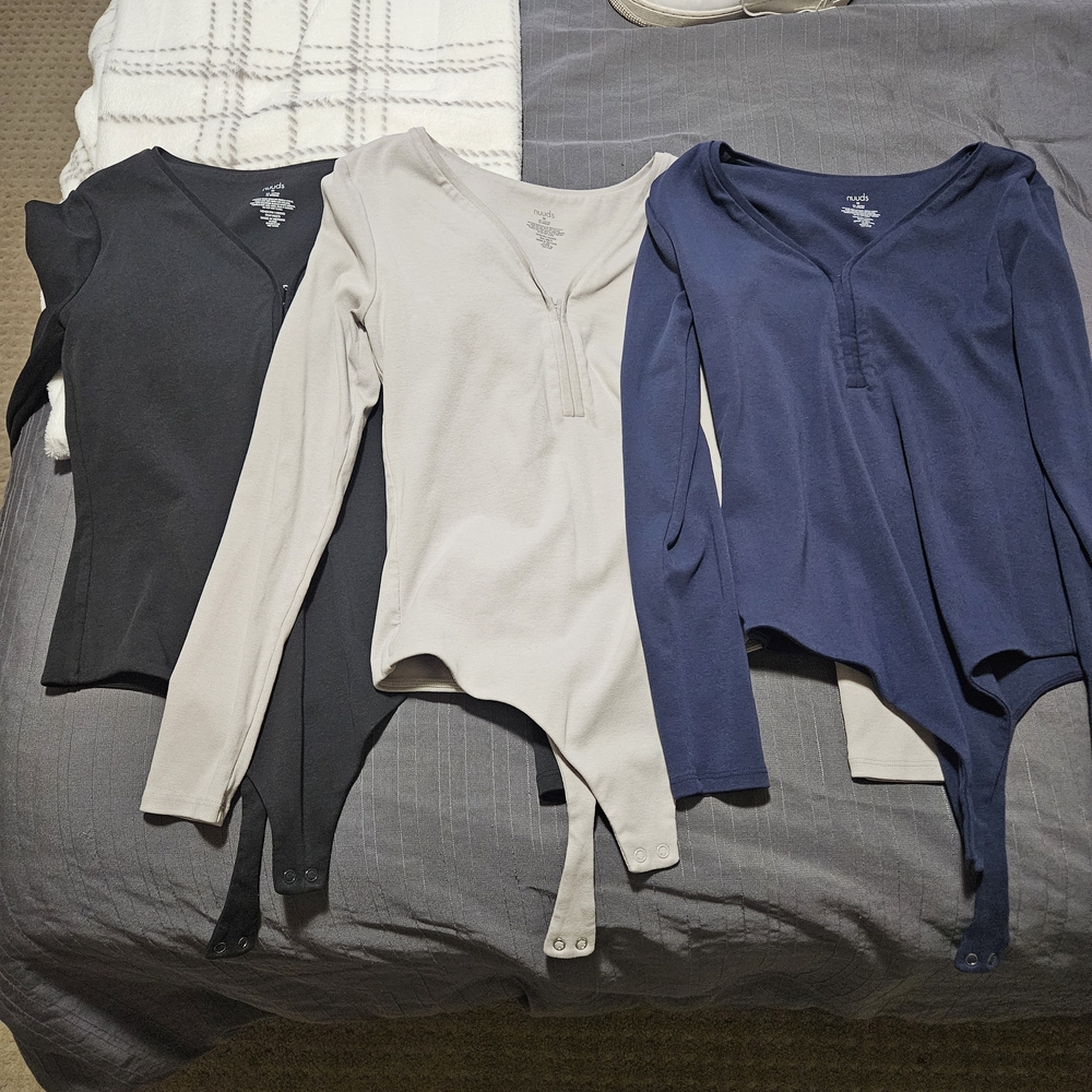 nuuds Long Sleeve Snap-Button Bodysuits in Black, Cream, and Navy
